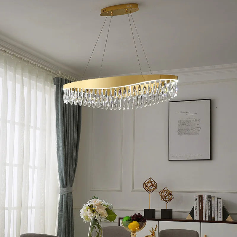 Afralia™ Water Drop Crystal Chandelier: Modern Golden Round Pendant Light for Stylish Ceiling Decor