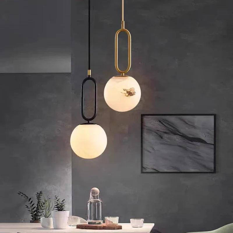 Afralia™ Brass LED Pendant Lights with Natural Marble Finish and Adjustable G9 Bulb