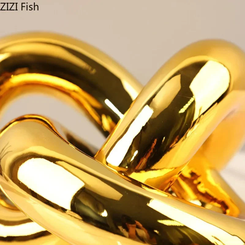 Afralia™ Gold-plated Knot Ornaments: Modern Geometric Resin Desk Decor & Room Craft