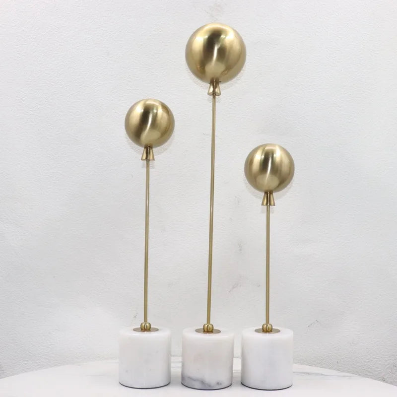 Afralia™ Golden Geometric Balloon Metal Ball Sculpture & Decorative Figurine