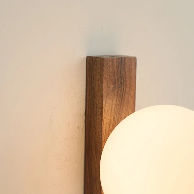 Afralia™ Walnut Wood and Glass Sphere Wall Sconce, Wabi-sabi Modern Style