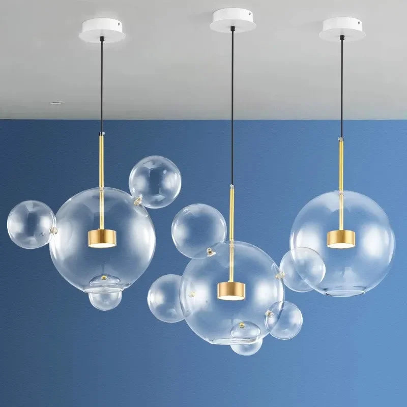 Afralia™ Modern Clear Glass Globe LED Pendant Light - Micky Copper Hanging Lamp