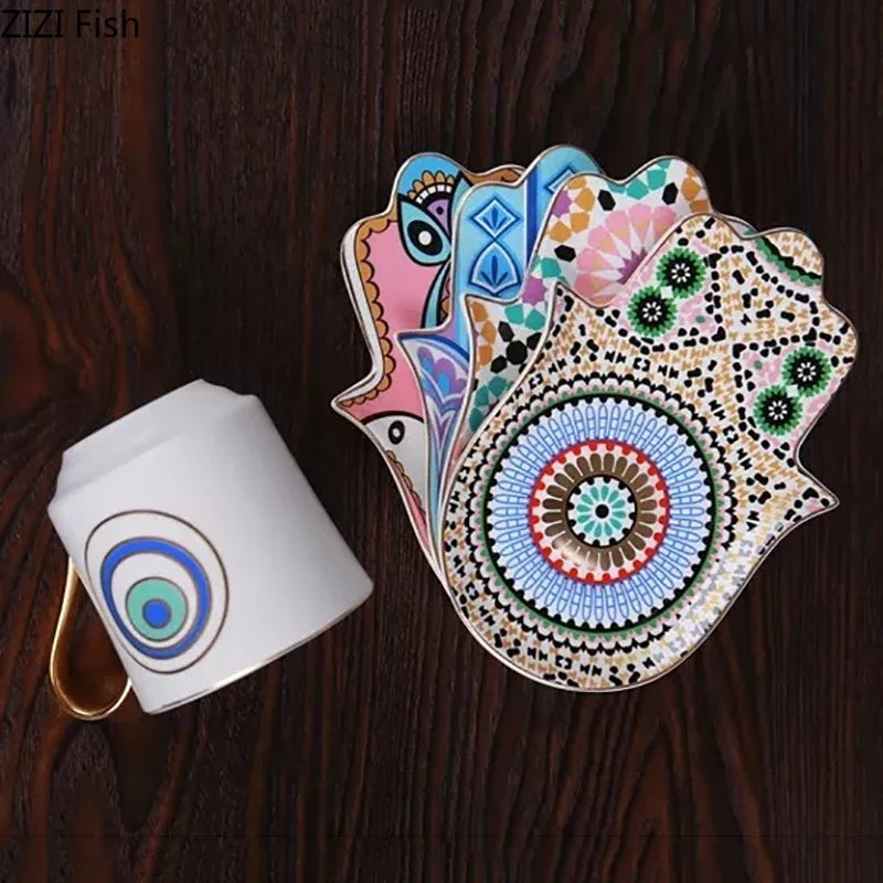 Afralia™ Mystical Gold Gilded Porcelain Coffee Cup & Saucer Set