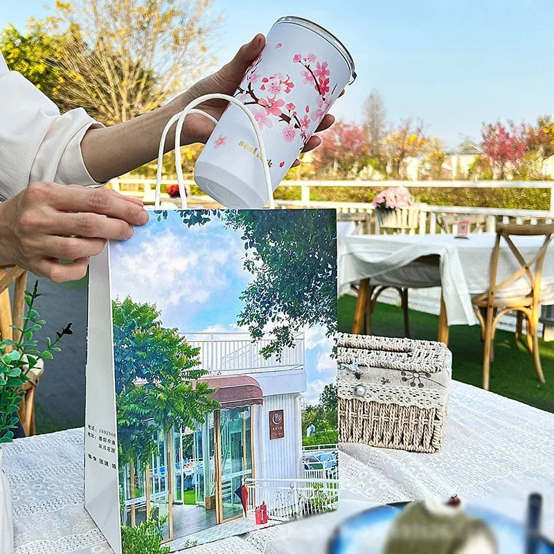 Afralia™ Cherry Blossom Stainless Steel Thermal Travel Mug with Leak-Proof Lid & Straw