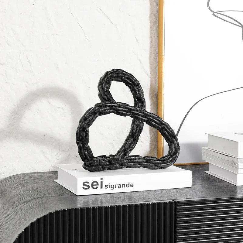 Afralia™ Golden Knot Chain Ring Geometric Decorative Figurine - Resin Home Decor Accessory