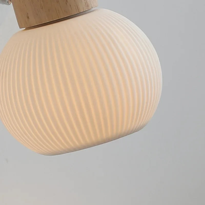 Afralia™ White Ceramic LED Wall Light with Pull Chain Switch and Wood Base