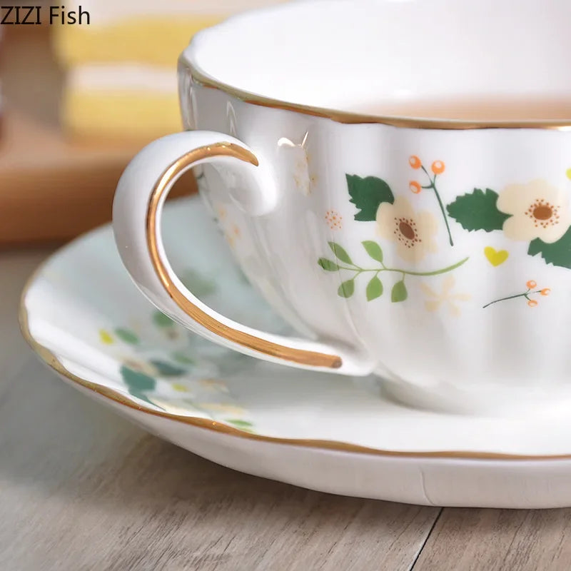 Afralia™ Elegant Gold Flower Cup & Saucer Set - Delicate Porcelain Tea Coffee Mug
