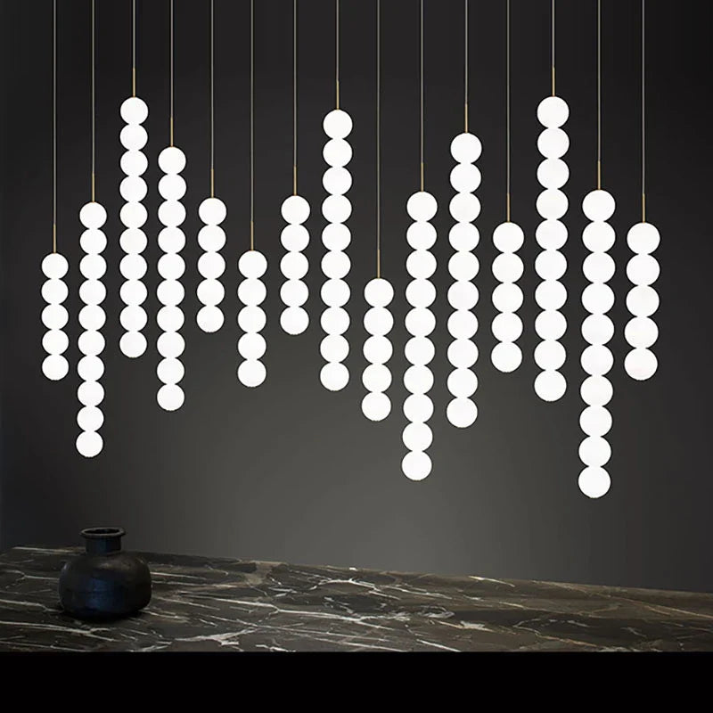 Afralia™ Art Deco LED Glass Pingpong Pendant Light in Gold Chrome Black.