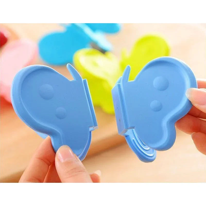 Afralia™ Butterfly Silicone Insulation Plate Clamp Kitchen Tool