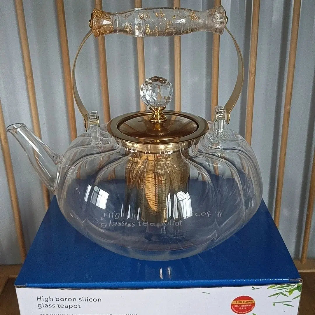 Afralia™ Amber Glass Teapot Filter, Heat-Resistant, Pumpkin-Shaped, Ideal for Boiling and Brewing Tea