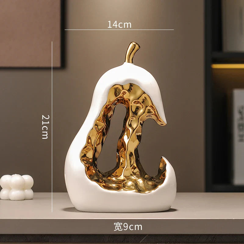 Afralia™ Ceramic Golden Pear Sculpture - Abstract Hollow Fruit Decor for Home Accessories