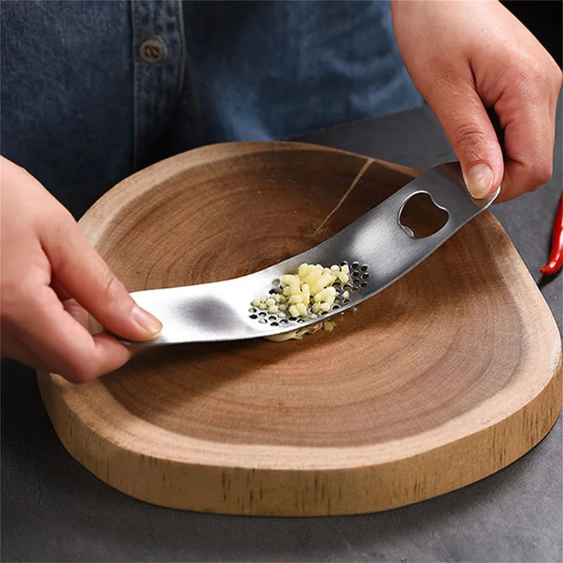 Afralia™ Garlic Press - Kitchen Gadget for Vegetables and Fruits