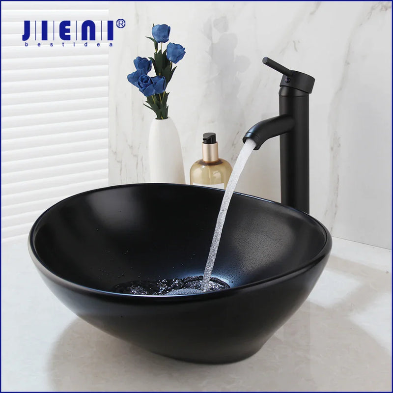 Afralia™ Matte Black Ceramic Oval Bathroom Bowl Sink with Brass Faucet Mixer Tap