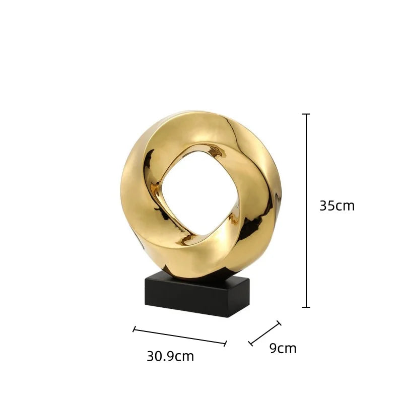Afralia™ Geometric Gold Hollowed Twisted Circles Figurines Home Decor
