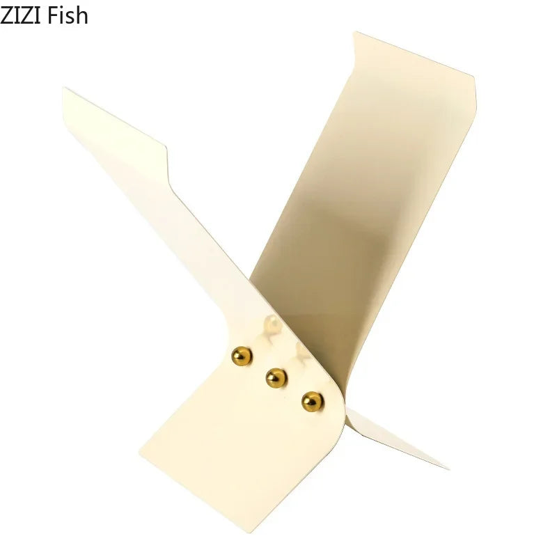 Afralia™ X-Shaped Bookshelf Beige Magazine Holder Modern Metal Rack Room Decor