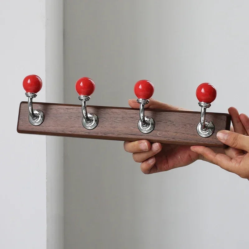 Afralia™ Walnut Wood Hat Hook Wall Storage with Decorative Shelves