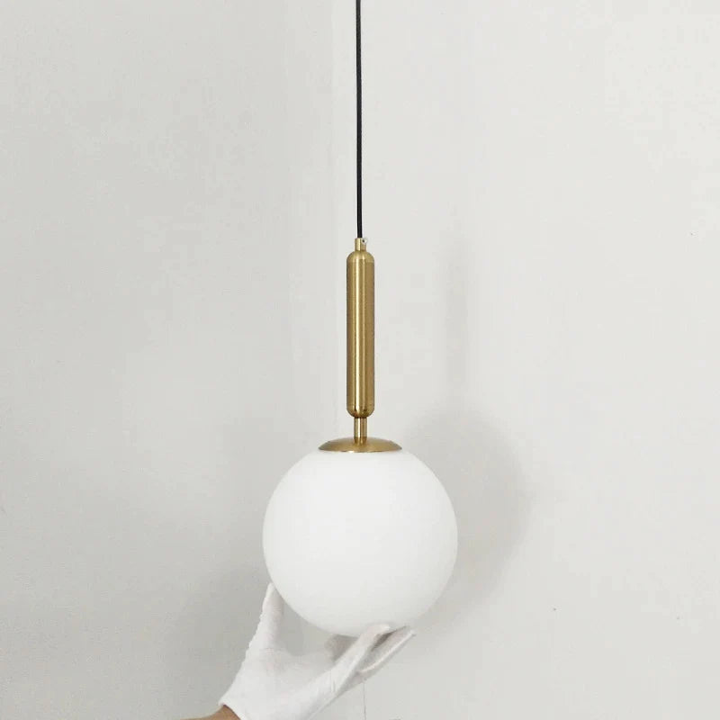 Luxury Gold Glass Ball Pendant Lamp by Afralia™ for Stylish Dining & Bedroom Lighting