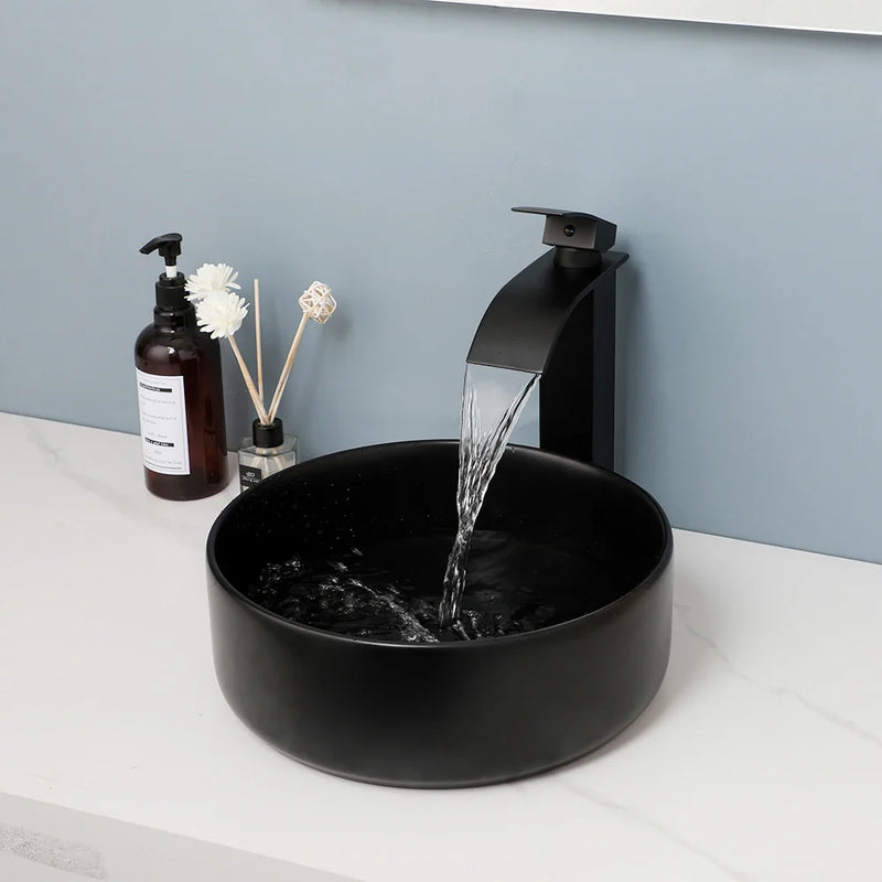 Afralia™ Matte Black Ceramic Basin Faucet Set with Waterfall Outlet and Drainer