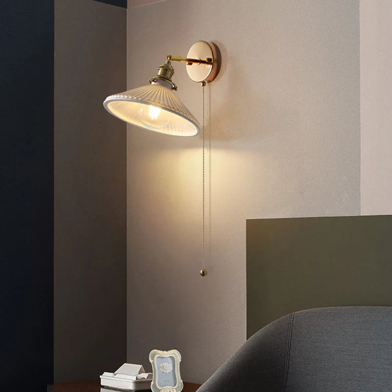 Afralia™ Copper Canopy LED Wall Sconce, White Ceramic Bedside Light for Bedroom, Modern Nordic Design