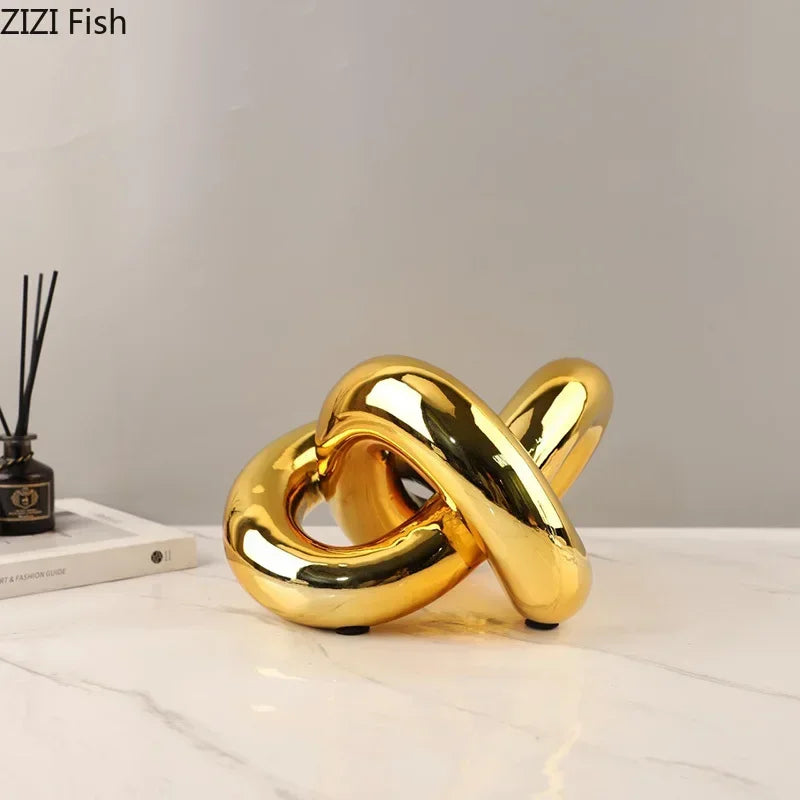 Afralia™ Gold-plated Knot Ornaments: Modern Geometric Resin Desk Decor & Room Craft