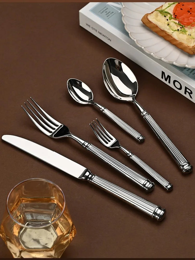 Afralia™ Golden Stainless Steel Flatware Set, 4Pcs Fork Knife Spoon Cutlery Kit.