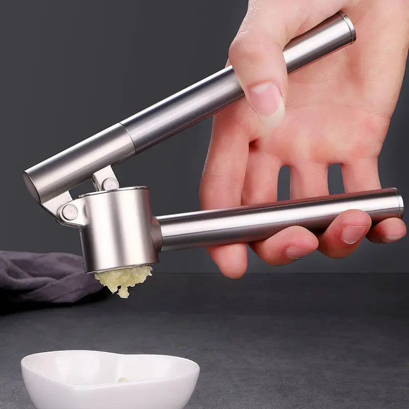 Afralia™ Stainless Steel Garlic Press Spoon Vegetables Chopper & Crusher