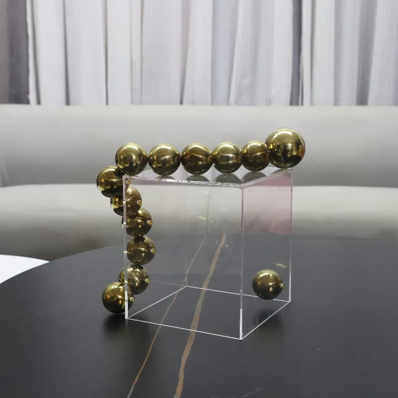 Afralia™ Geometric Sculpture: Clear Acrylic Cube with Golden Ball, Metal Cover; Home Decoration Accessory