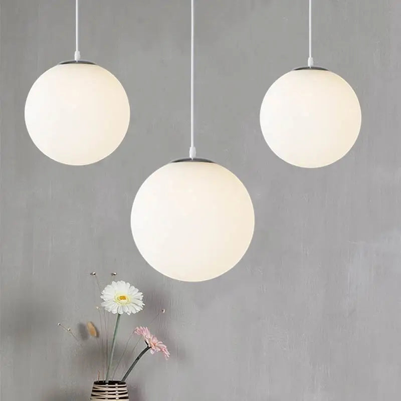 Afralia™ Glass Ball Pendant Lights: Elegant Globe Hanging Lamps for Home, Restaurant & Bar.