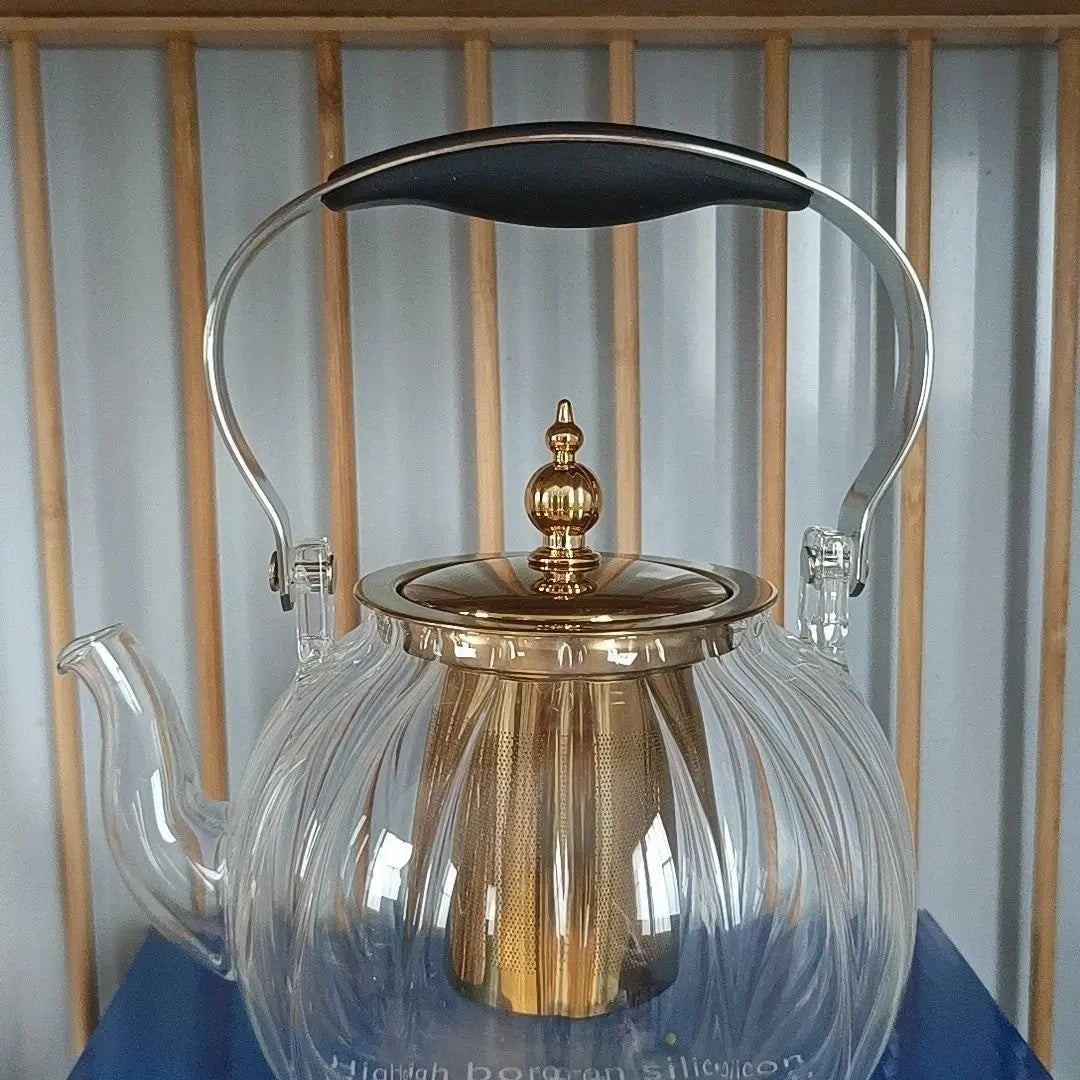 Afralia™ Amber Glass Teapot Filter, Heat-Resistant, Pumpkin-Shaped, Ideal for Boiling and Brewing Tea