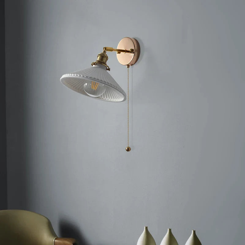 Afralia™ Copper Canopy LED Wall Sconce, White Ceramic Bedside Light for Bedroom, Modern Nordic Design