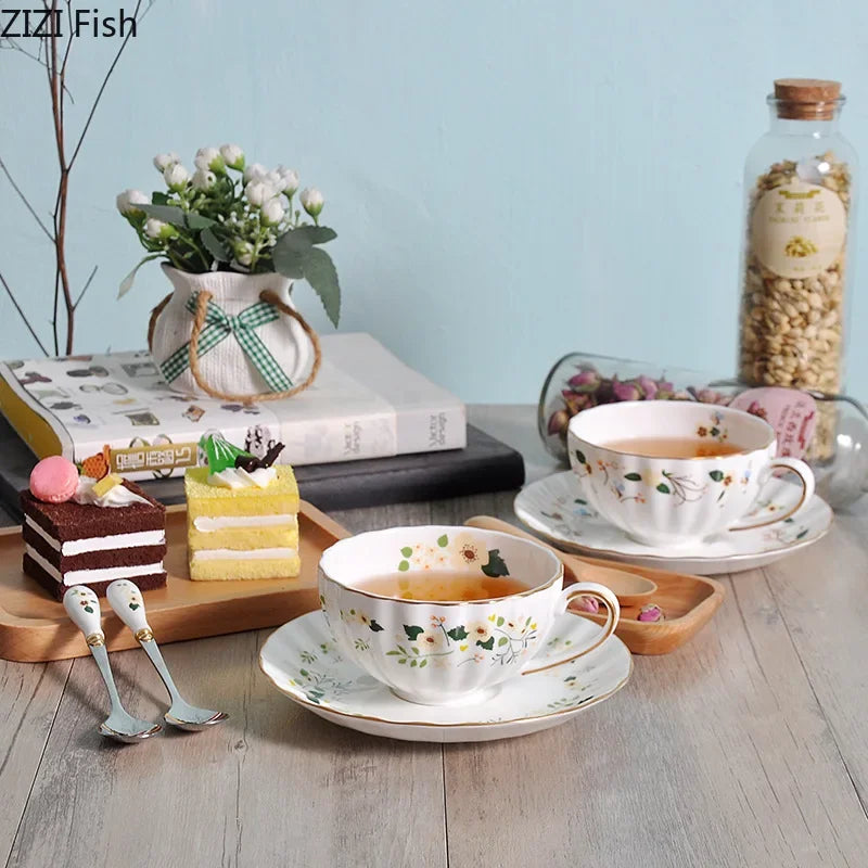 Afralia™ Elegant Gold Flower Cup & Saucer Set - Delicate Porcelain Tea Coffee Mug