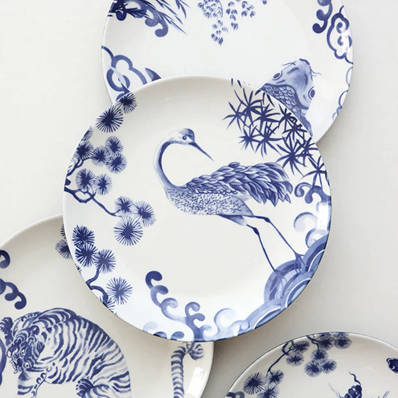 Afralia™ Blue and White Ceramic Animal Dinner Plates - Set of 4