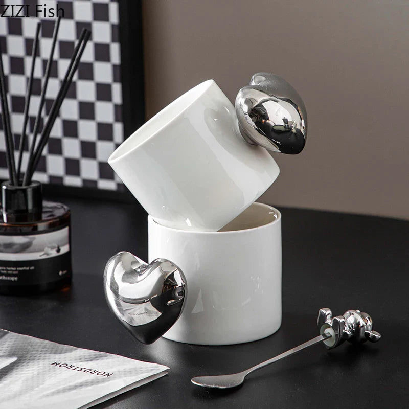 Afralia™ Silver Heart Handle Mug - Ceramic Coffee Cup for Dining Table or Afternoon Tea