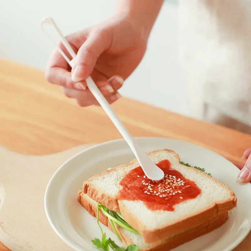 Afralia™ Mini Plastic Egg Whisk | Multi-Function Egg Beater & Seasoning Stirring Stick