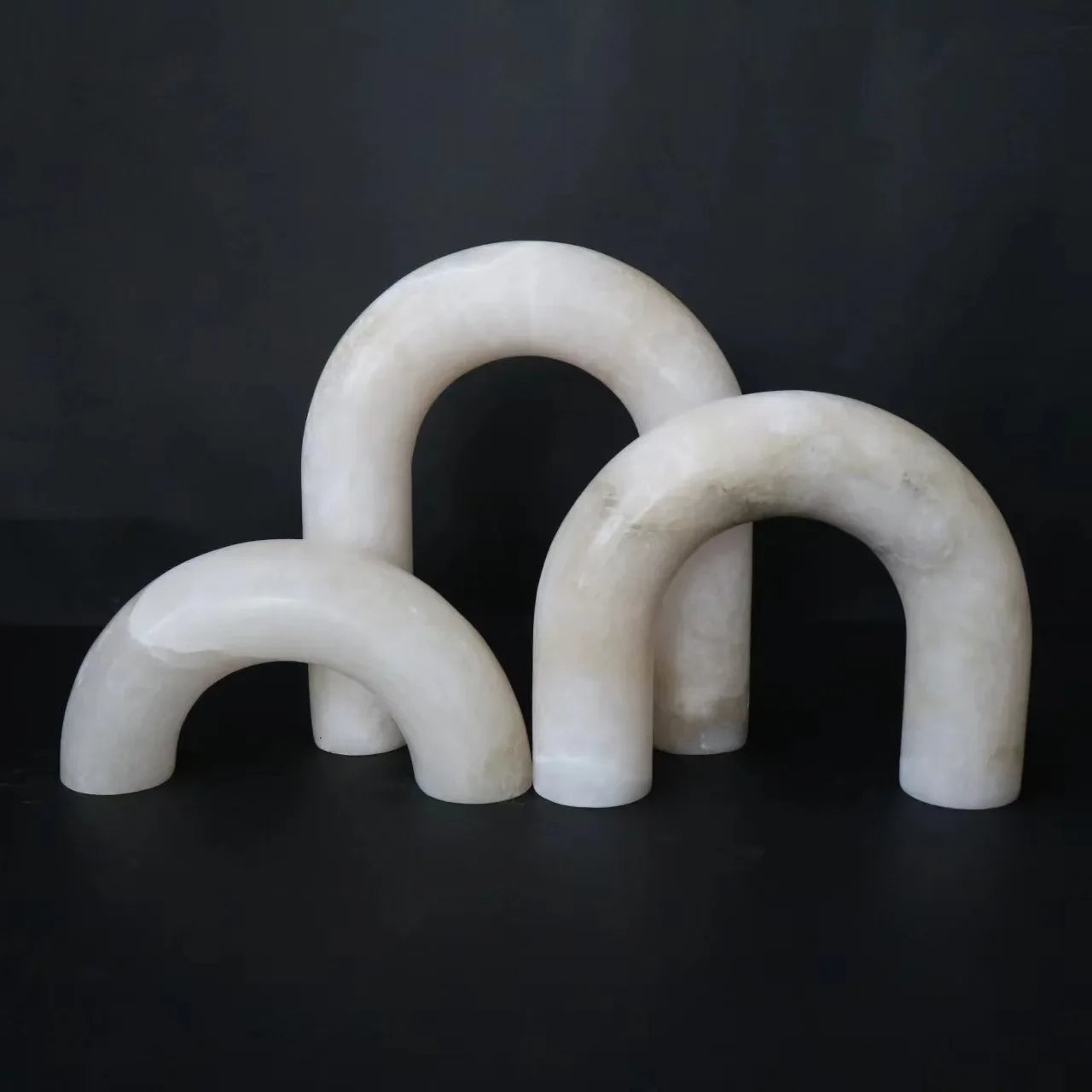 Afralia™ Marble Geometric Arch Sculpture: Elegant Yellow Cave Stone Ornament for Living Room.