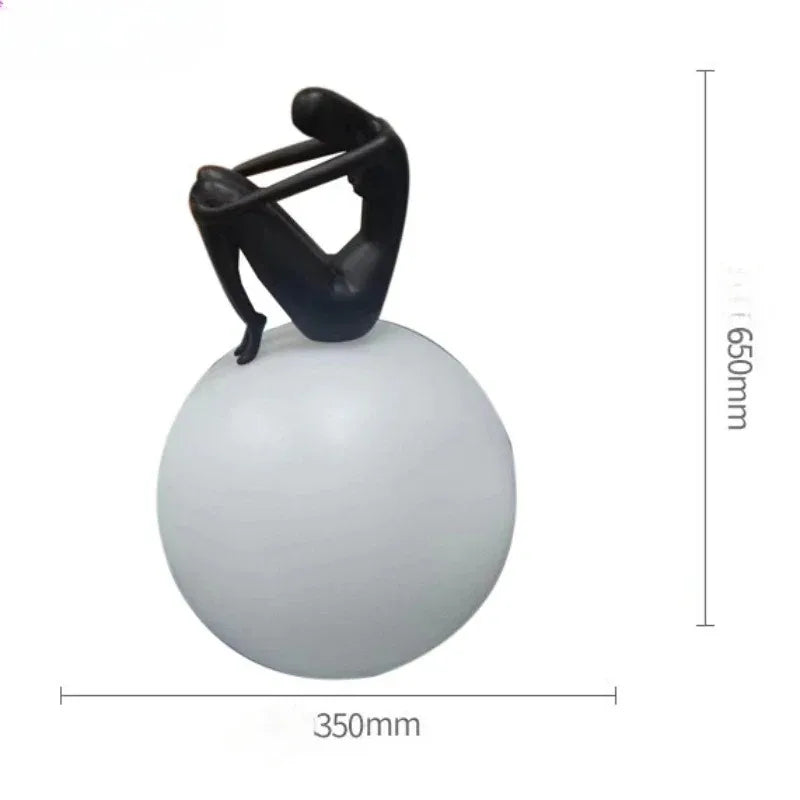 Afralia™ Ball Holding Character Resins Lamp for Living Room Bedroom