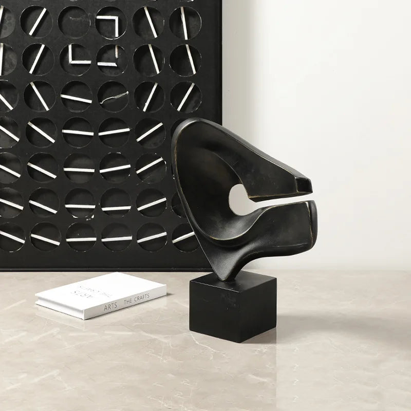 Afralia™ Abstract Hollowed-out Resin Sculpture, Black and White Modern Home Decor Statue.