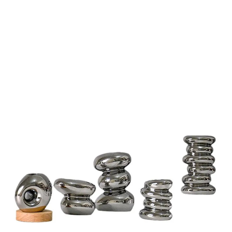 Afralia™ Silver Pebble Ceramic Geometric Vase for Floral Arrangement and Room Decoration