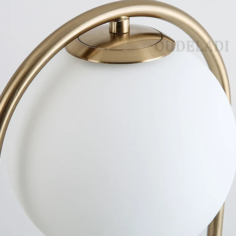 Afralia™ Nordic Golden Body Desk Lamp with Frosted Glass Shade